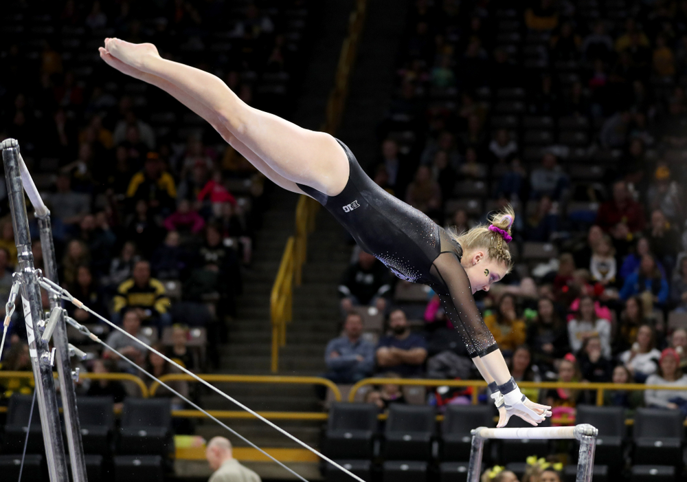 Iowa’s Allyson Steffensmeier competes on the bars against Michigan Friday, February 14, 2020 at Carver-Hawkeye Arena. (Brian Ray/hawkeyesports.com)