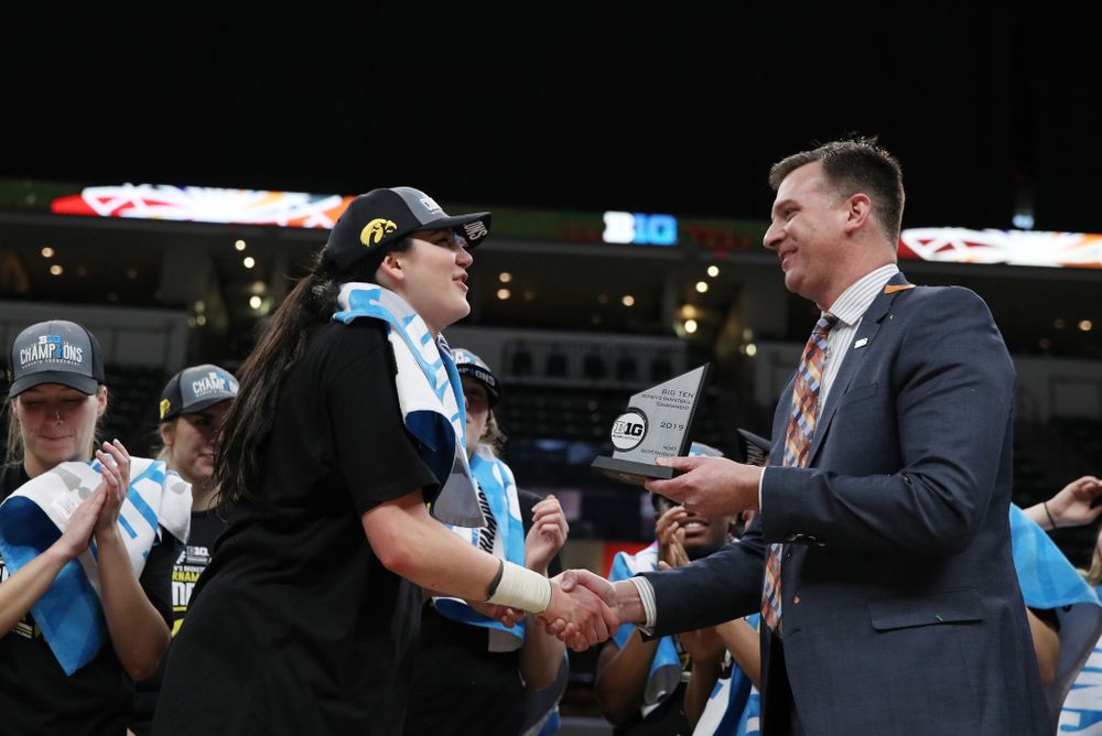 Iowa Hawkeyes forward Megan Gustafson (10) receives the Most Outstanding Player Award following their win against the Maryland Terrapins Sunday, March 10, 2019 at Bankers Life Fieldhouse in Indianapolis, Ind. (Brian Ray/hawkeyesports.com)