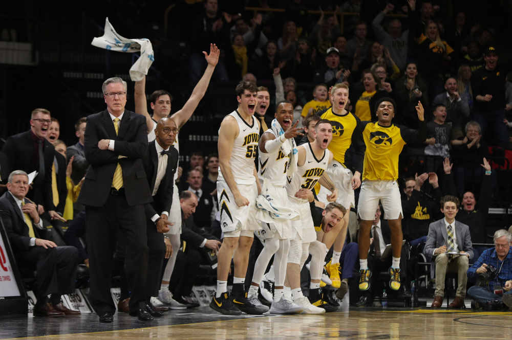 The Iowa Hawkeyes celebrate a three point basket against the Michigan Wolverines Friday, February 1, 2019 at Carver-Hawkeye Arena. (Brian Ray/hawkeyesports.com)