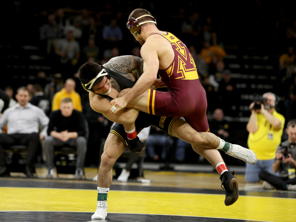 Iowa’s Pat Lugo wrestles Minnesota’s Brayton Lee at 149 pounds Saturday, February 15, 2020 at Carver-Hawkeye Arena. Lugo won the match 3-2. (Brian Ray/hawkeyesports.com)