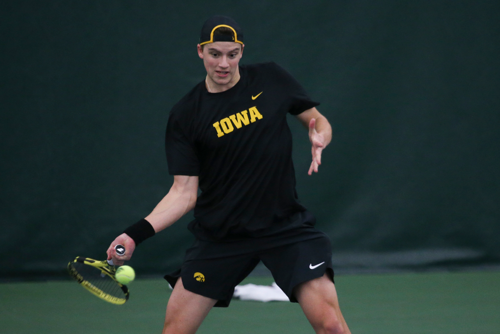 Iowa’s Joe Tyler returns a hit during the Iowa men’s tennis meet vs VCU on Saturday, February 29, 2020 at the Hawkeye Tennis and Recreation Complex. (Lily Smith/hawkeyesports.com)