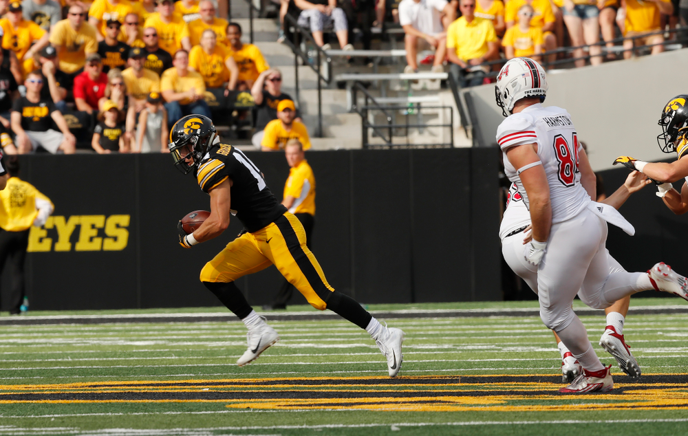 Iowa Hawkeyes wide receiver Kyle Groeneweg (14) returns a punt against the Northern Illinois Huskies Saturday, September 1, 2018 at Kinnick Stadium. (Brian Ray/hawkeyesports.com)