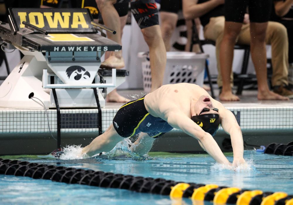 Iowa's Kenneth Mende swims the backstroke leg of the 200 medley relay at the 2019 Big Ten Swimming and Diving meet Wednesday, February 27, 2019 at the Campus Wellness and Recreation Center. (Brian Ray/hawkeyesports.com)