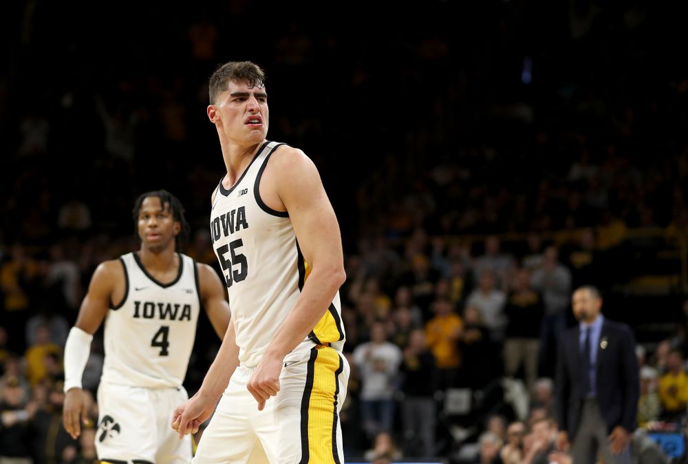 Iowa Hawkeyes forward Luka Garza (55) reacts after making a shot against the Michigan Wolverines Friday, January 17, 2020 at Carver-Hawkeye Arena. (Brian Ray/hawkeyesports.com)
