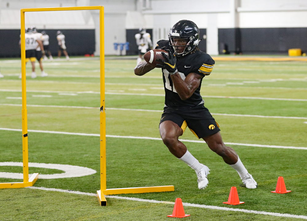 Iowa Hawkeyes wide receiver Brandon Smith (12) pulls in a pass during Fall Camp Practice No. 9 at the Hansen Football Performance Center in Iowa City on Monday, Aug 12, 2019. (Stephen Mally/hawkeyesports.com)