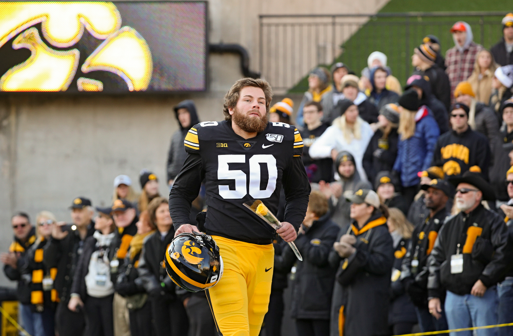 Iowa Hawkeyes long snapper Jackson Subbert (50) is acknowledged on senior day before their game at Kinnick Stadium in Iowa City on Saturday, Nov 23, 2019. (Stephen Mally/hawkeyesports.com)