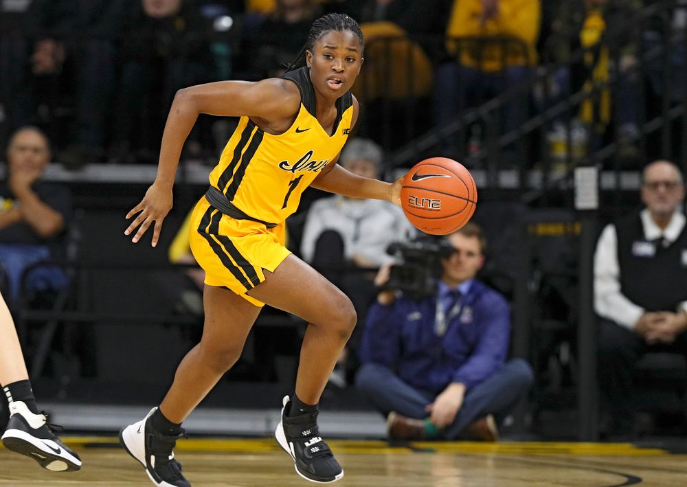 Iowa Hawkeyes guard Tomi Taiwo (1) brings the ball down the court during the second quarter of their game at Carver-Hawkeye Arena in Iowa City on Thursday, January 23, 2020. (Stephen Mally/hawkeyesports.com)