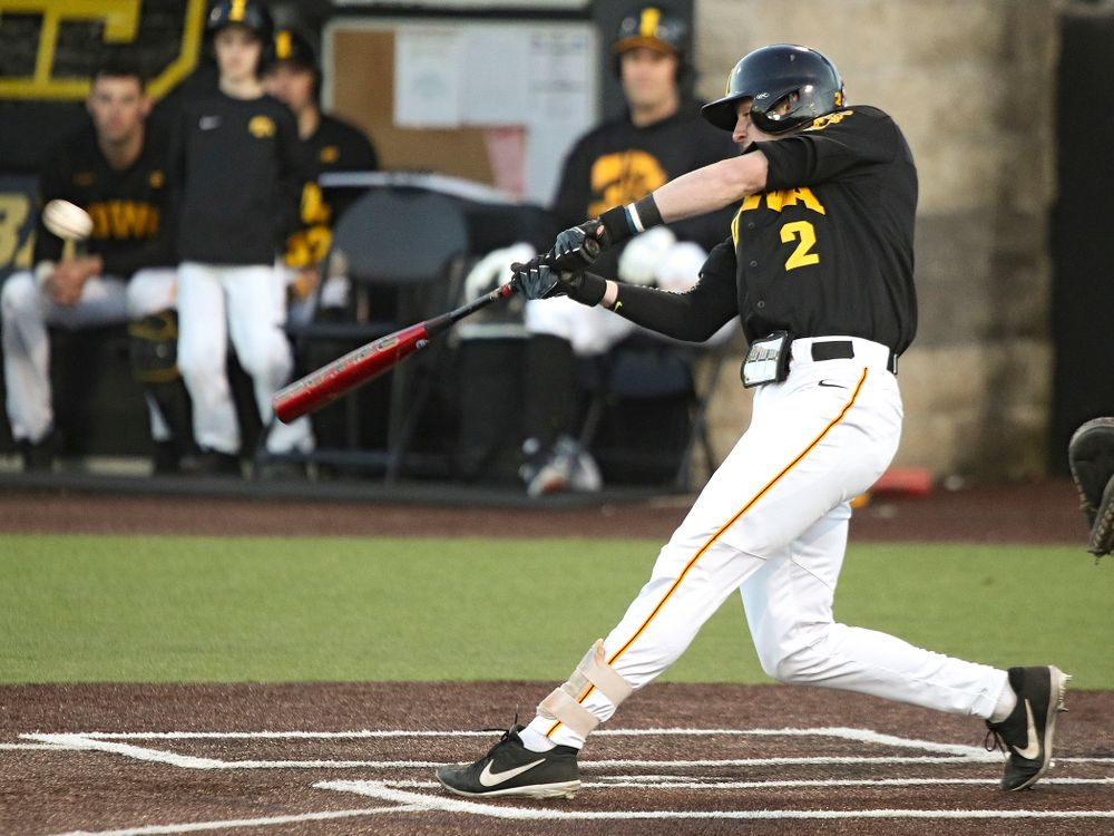 Iowa infielder Brendan Sher (2) drives a pitch for a hit during the fifth inning of their game at Duane Banks Field in Iowa City on Tuesday, March 3, 2020. (Stephen Mally/hawkeyesports.com)