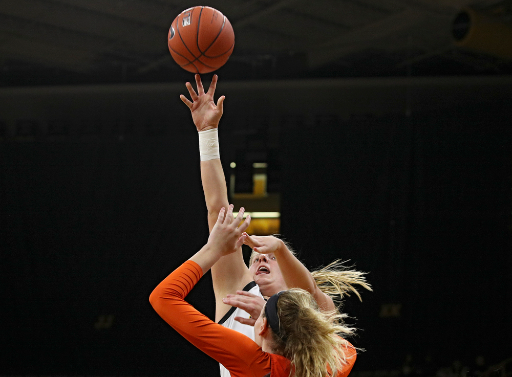 Iowa forward/center Monika Czinano (25) puts up a shot during the first quarter of their overtime win against Princeton at Carver-Hawkeye Arena in Iowa City on Wednesday, Nov 20, 2019. (Stephen Mally/hawkeyesports.com)