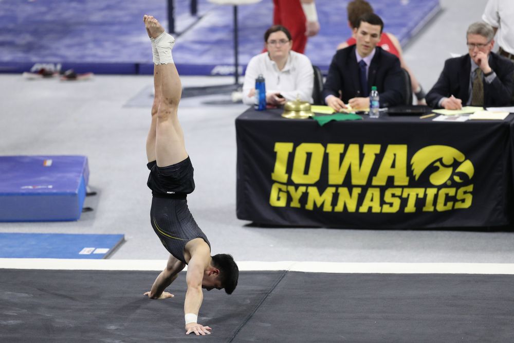 Iowa's Bennet Huang competes on the floor against Oklahoma Saturday, February 9, 2019 at Carver-Hawkeye Arena. (Brian Ray/hawkeyesports.com)