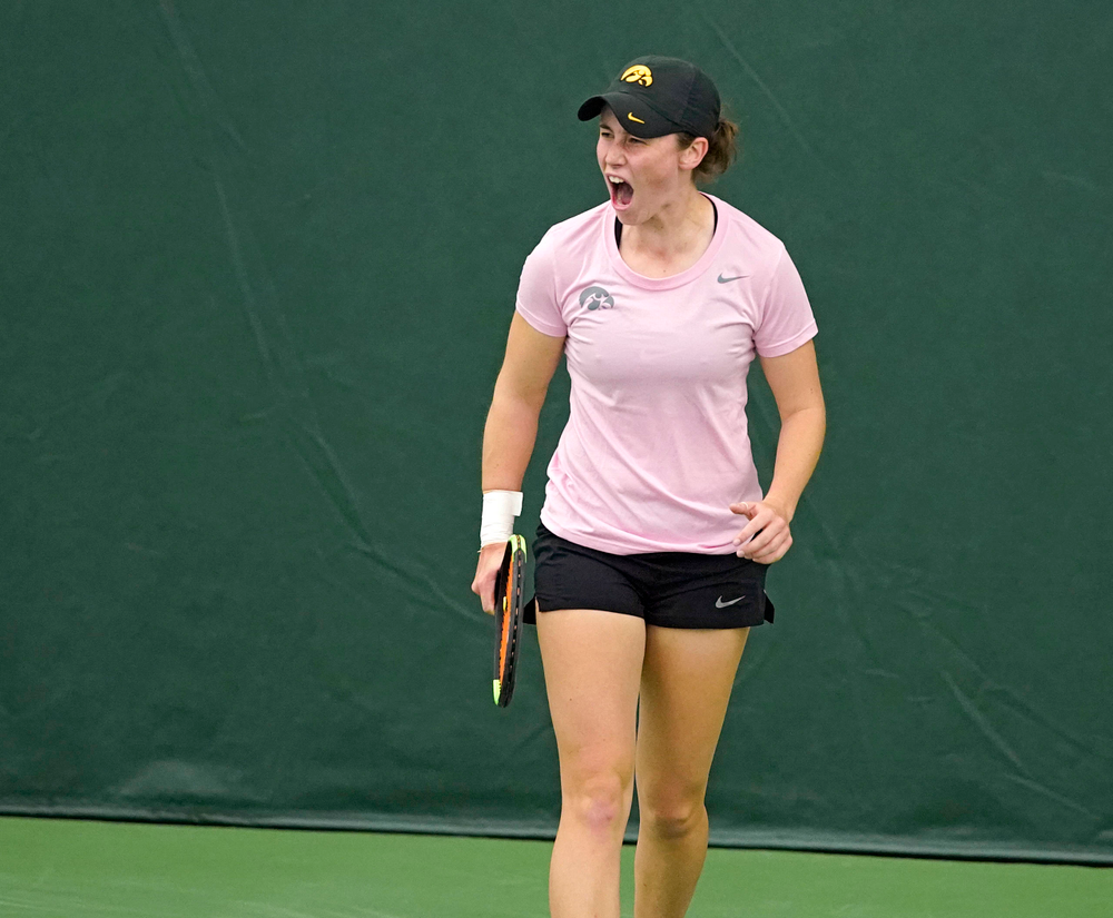 Iowa's Elise van Heuvelen Treadwell celebrates a score during her match against Purdue at the Hawkeye Tennis and Recreation Complex in Iowa City on Friday, Mar. 29, 2019. (Stephen Mally/hawkeyesports.com)