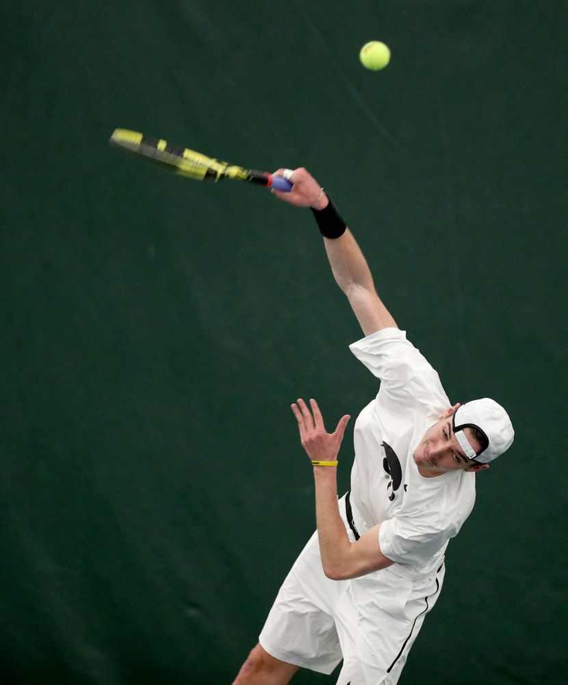 Iowa’s Nikita Snezhko against Cornell Sunday, March 8, 2020 at the Hawkeye Tennis and Recreation Center. (Brian Ray/hawkeyesports.com)