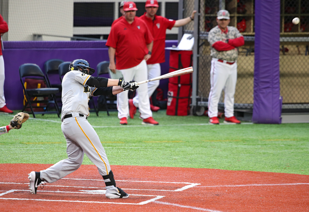 Iowa Hawkeyes outfielder Zeb Adreon (5) hits a double during the ninth inning of their CambriaCollegeClassic game at U.S. Bank Stadium in Minneapolis, Minn. on Friday, February 28, 2020. (Stephen Mally/hawkeyesports.com)