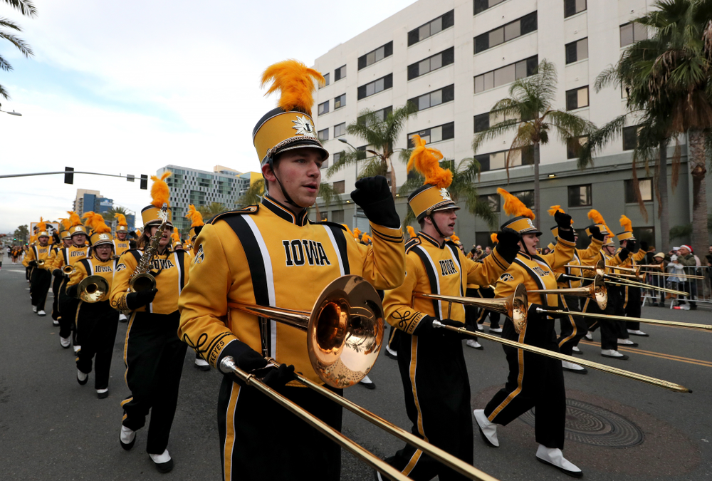 The Hawkeye Marching Band and the Iowa Spirit Squad march in the Holiday Bowl Parade Thursday, December 26, 2019 in San Diego. (Brian Ray/hawkeyesports.com)