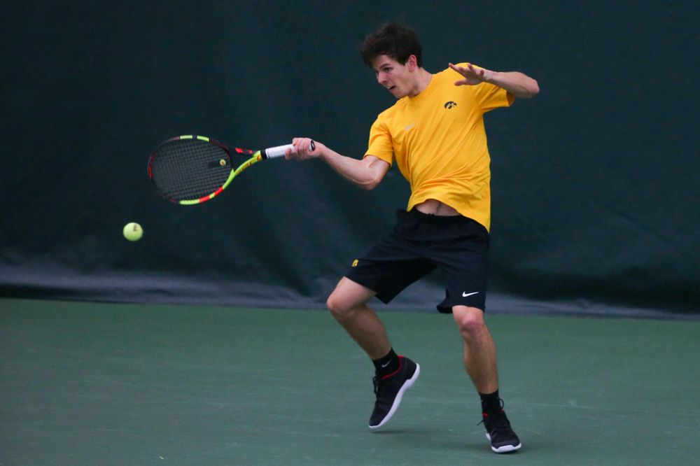 Iowa's Joe Tyler at a tennis match vs Drake Friday, March 8, 2019 at the Hawkeye Tennis and Recreation Complex. (Lily Smith/hawkeyesports.com)