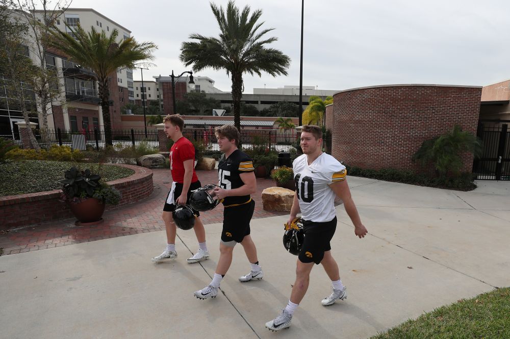 Iowa Hawkeyes defensive end Parker Hesse (40), fullback Joe Ludwig (45), and quarterback Spencer Petras (7) during the team's first Outback Bowl Practice in Florida Thursday, December 27, 2018 at Tampa University. (Brian Ray/hawkeyesports.com)