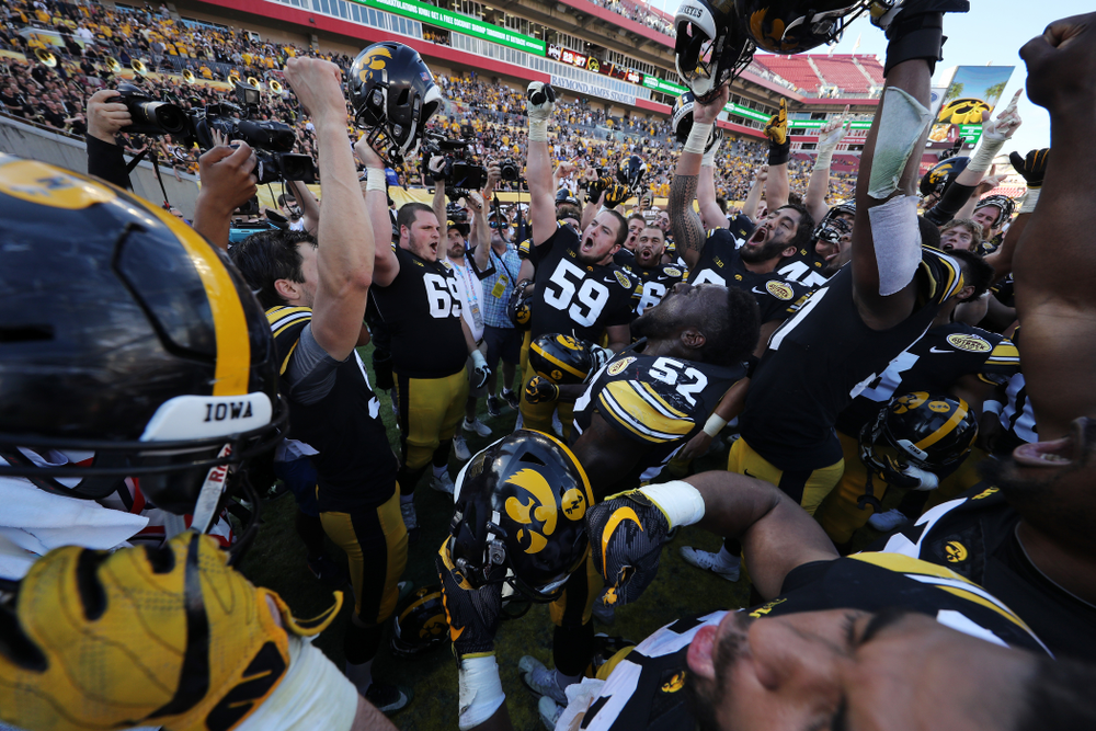 The Iowa Hawkeyes sing the Fight Song following the Outback Bowl Tuesday, January 1, 2019 at Raymond James Stadium in Tampa, FL. (Brian Ray/hawkeyesports.com)