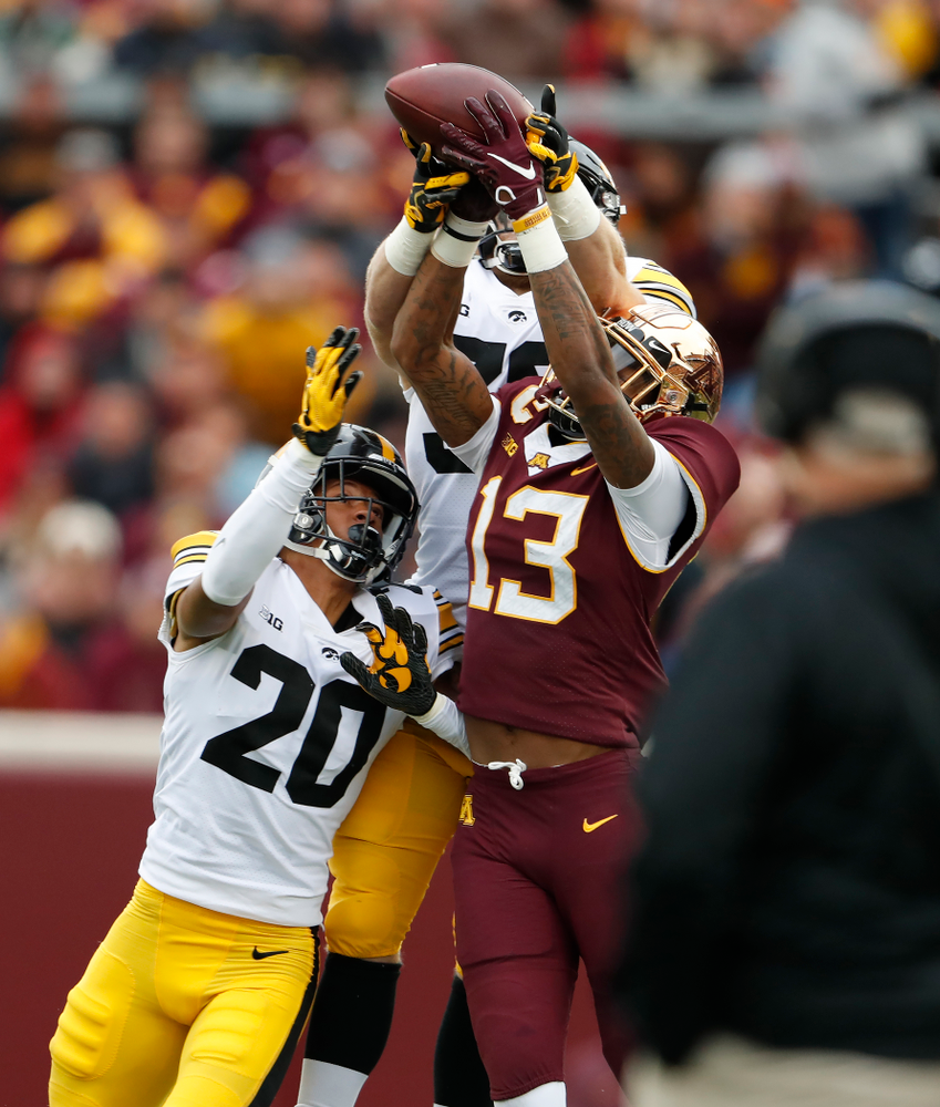 Iowa Hawkeyes defensive back Julius Brents (20) and defensive back Julius Brents (20) break up a pass against the Minnesota Golden Gophers Saturday, October 6, 2018 at TCF Bank Stadium. (Brian Ray/hawkeyesports.com)