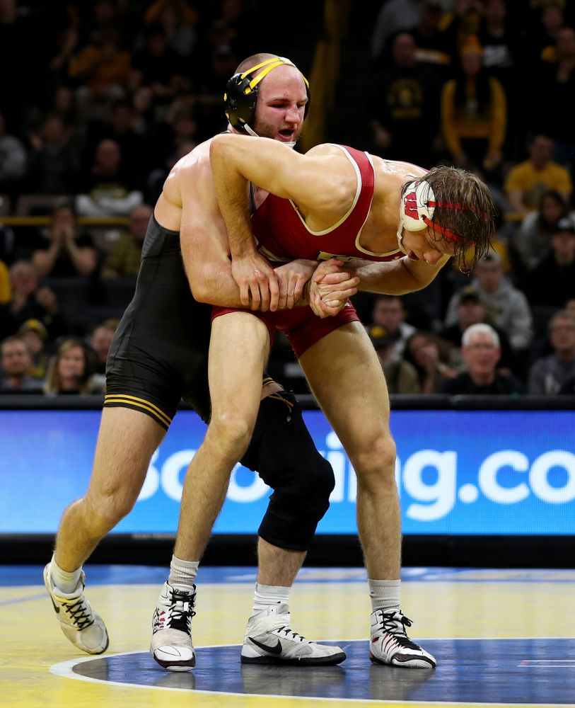 IowaÕs Alex Marinelli wrestles WisconsinÕs Evan Wick at 165 pounds Sunday, December 1, 2019 at Carver-Hawkeye Arena. Marinelli won the match 4-2. (Brian Ray/hawkeyesports.com)