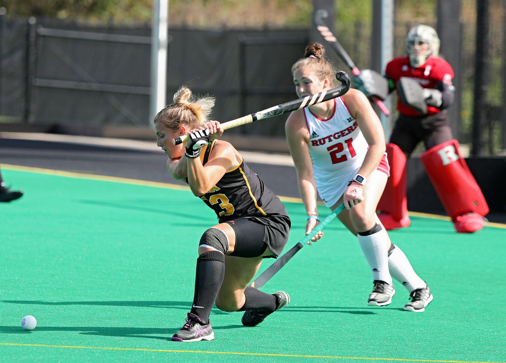 Iowa’s Leah Zellner (13) lines up a shot during the first quarter of their match at Grant Field in Iowa City on Friday, Oct 4, 2019. (Stephen Mally/hawkeyesports.com)