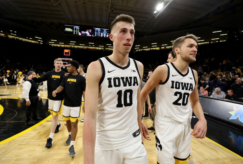 Iowa Hawkeyes guard Joe Wieskamp (10) and forward Riley Till (20) against the Minnesota Golden Gophers Monday, December 9, 2019 at Carver-Hawkeye Arena. (Brian Ray/hawkeyesports.com)