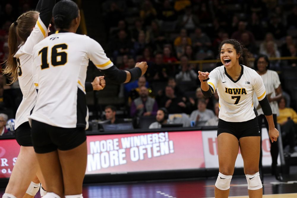 Iowa Hawkeyes setter Brie Orr (7) celebrates after winning a point during a match against Nebraska at Carver-Hawkeye Arena on November 7, 2018. (Tork Mason/hawkeyesports.com)