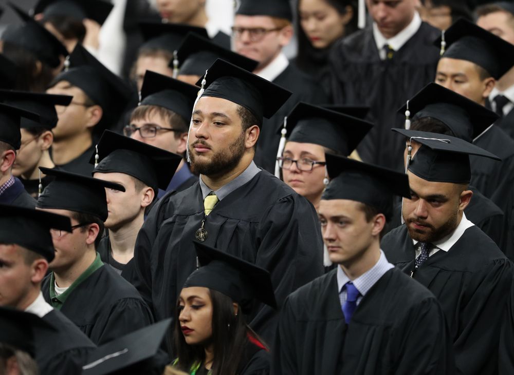 Iowa Football's Austin Kelly and Dalton Ferguson during the Fall Commencement Ceremony Saturday, December 15, 2018 at Carver-Hawkeye Arena. (Brian Ray/hawkeyesports.com)