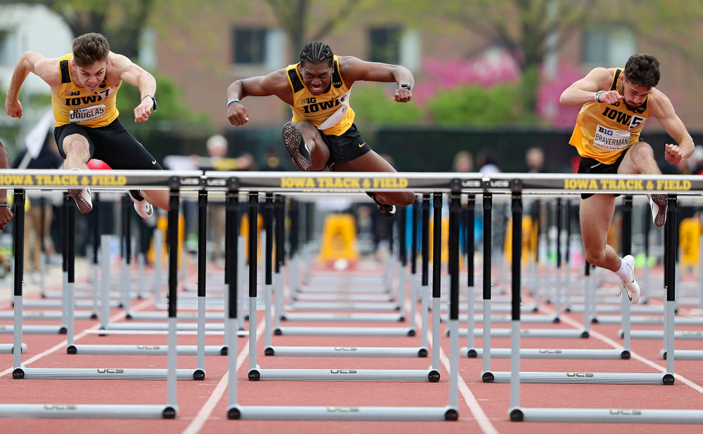 Iowa's Chris Douglas (from left), Anthony Williams, and Josh Braverman run the men’s 110 meter hurdles event on the third day of the Big Ten Outdoor Track and Field Championships at Francis X. Cretzmeyer Track in Iowa City on Sunday, May. 12, 2019. (Stephen Mally/hawkeyesports.com)