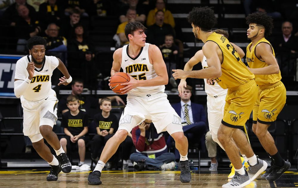 Iowa Hawkeyes forward Luka Garza (55) looks to pass the ball during a game against Alabama State at Carver-Hawkeye Arena on November 21, 2018. (Tork Mason/hawkeyesports.com)