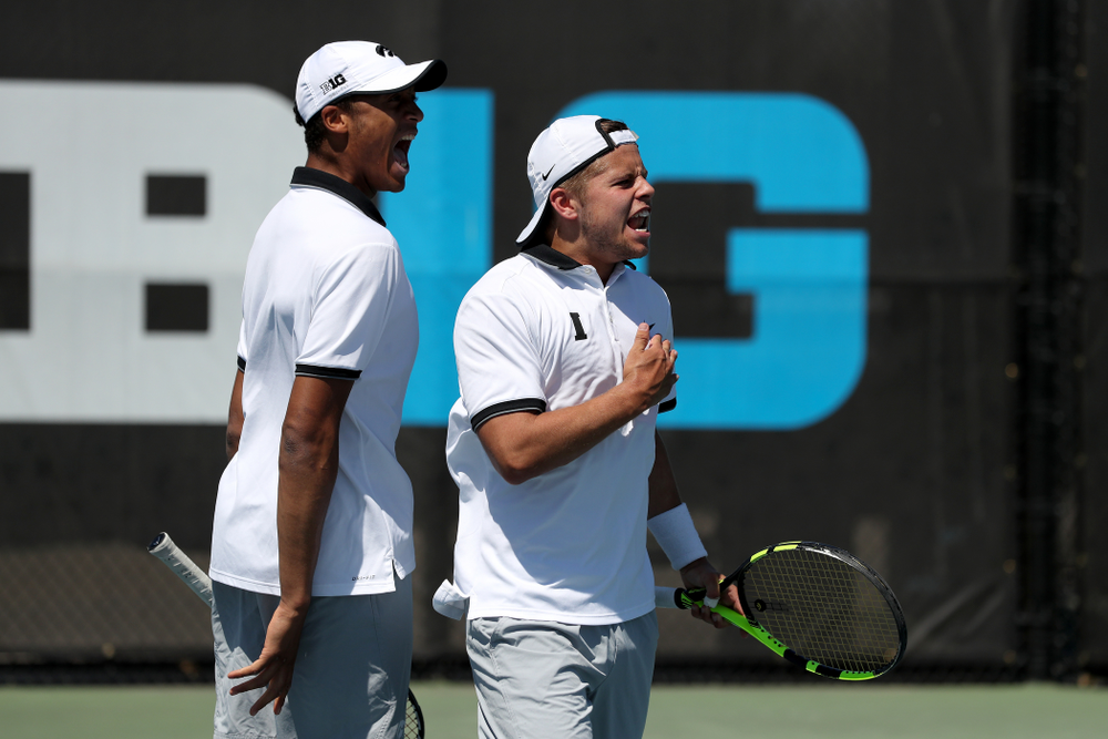 IowaÕs Oliver Okonkwo and Will Davies play a doubles match against the Michigan Wolverines Sunday, April 21, 2019 at the Hawkeye Tennis and Recreation Complex. (Brian Ray/hawkeyesports.com)