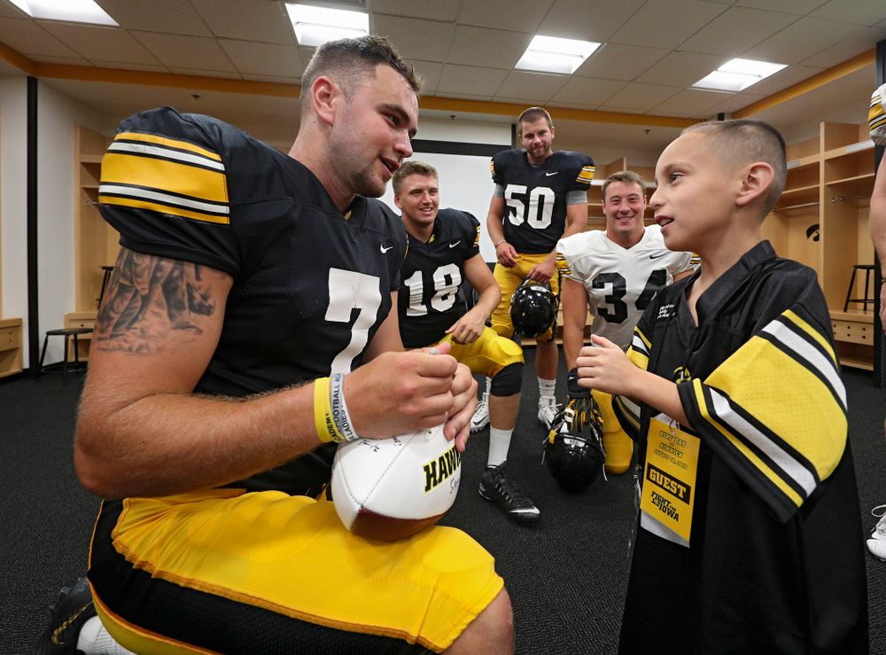 Iowa Hawkeyes punter Colten Rastetter (7) talks with
2019 Kid Captain Skylar Hardee during Kids Day at Kinnick Stadium in Iowa City on Saturday, Aug 10, 2019. (Stephen Mally/hawkeyesports.com)