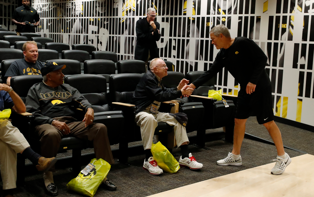 Iowa Hawkeyes head coach Kirk Ferentz talks with members of the 1958 National Championship Team as they tour the Hansen Football Performance Center Friday, September 21, 2018. (Brian Ray/hawkeyesports.com)