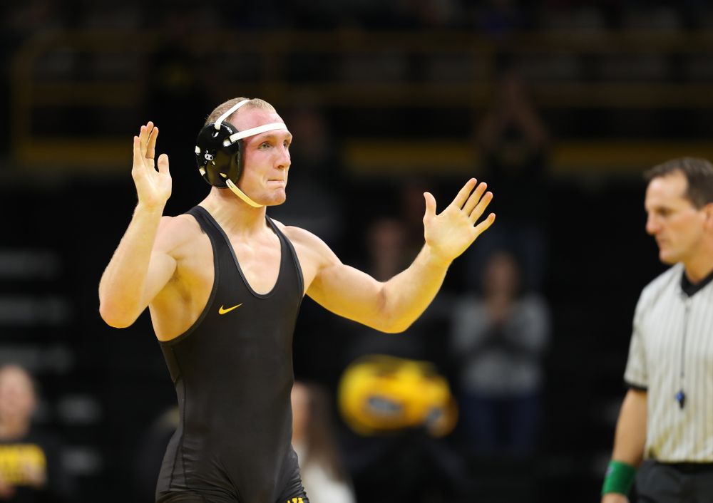 Iowa's Kaleb Young wrestles Purdue's Griffin Parriott at 157 pounds Saturday, November 24, 2018 at Carver-Hawkeye Arena. (Brian Ray/hawkeyesports.com)