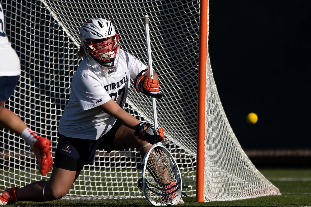 STANFORD, California - FEBRUARY 14: Virginia Cavaliers goalkeeper Charlie Campbell (27) makes a save against the Stanford Cardinal during the first half at Cagan Stadium on February 14, 2020 in Stanford, California. The Virginia Cavaliers defeated the Stanford Cardinal 12-11. (Photo by Jason O. Watson)