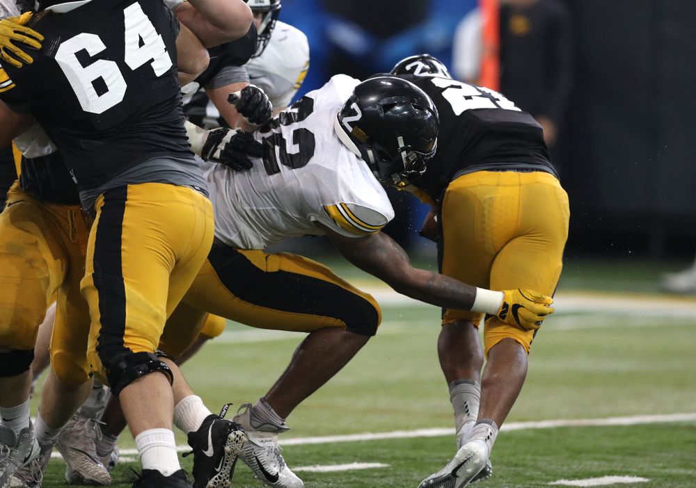 Iowa Hawkeyes linebacker Djimon Colbert (32) and running back Ivory Kelly-Martin (21) During Fall Camp Practice No. 6 Thursday, August 8, 2019 at the Ronald D. and Margaret L. Kenyon Football Practice Facility. (Brian Ray/hawkeyesports.com)