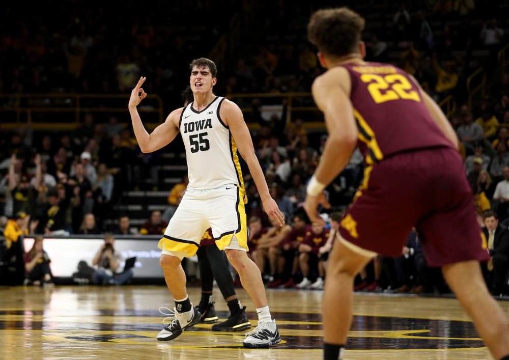 Iowa Hawkeyes forward Luka Garza (55) celebrates a three point basket against the Minnesota Golden Gophers Monday, December 9, 2019 at Carver-Hawkeye Arena. (Brian Ray/hawkeyesports.com)