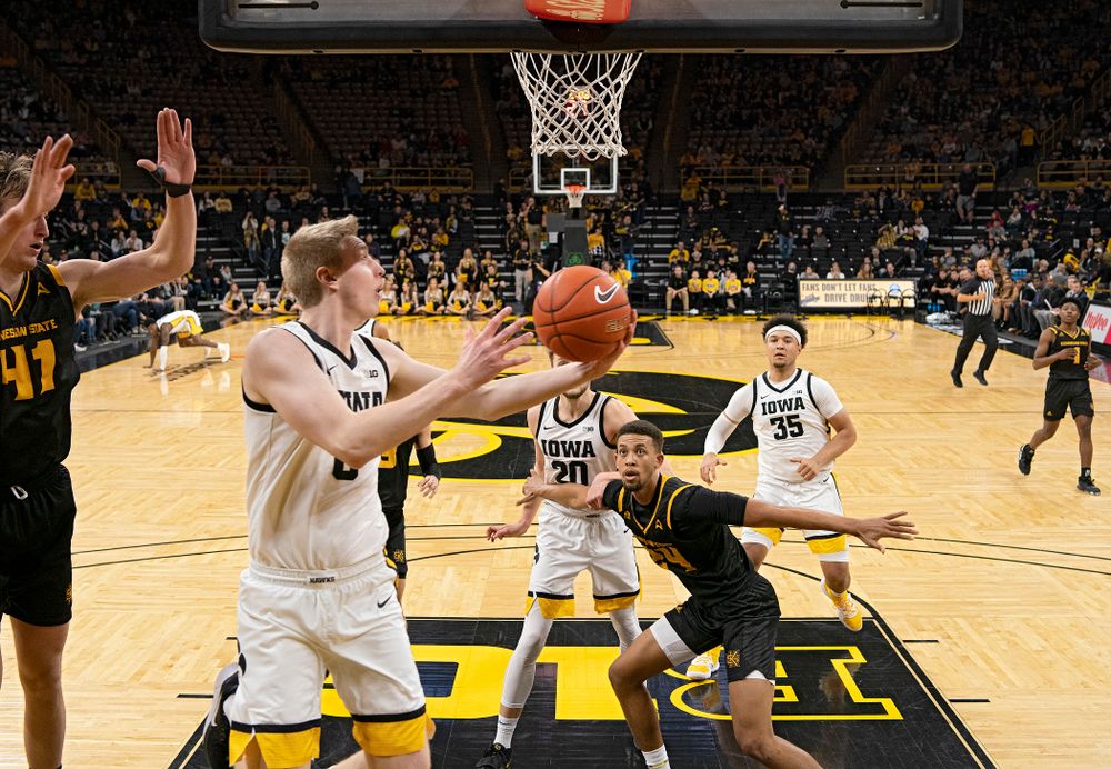 Iowa Hawkeyes forward Michael Baer (0) scores a basket during the second half of their their game at Carver-Hawkeye Arena in Iowa City on Sunday, December 29, 2019. (Stephen Mally/hawkeyesports.com)
