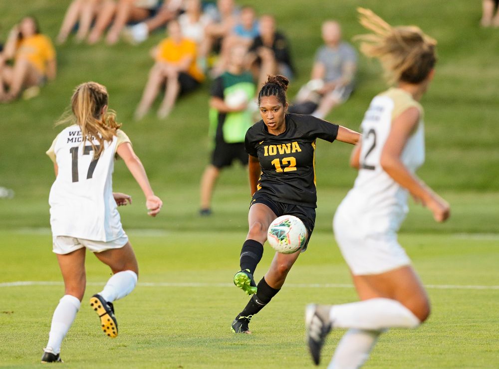Iowa forward Olivia Fiegel (12) passes the ball during the first half of their match against Western Michigan at the Iowa Soccer Complex in Iowa City on Thursday, Aug 22, 2019. (Stephen Mally/hawkeyesports.com)