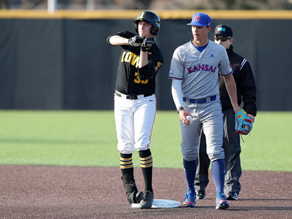 Iowa designated hitter Trenton Wallace (38) celebrates after hitting an RBI double during the third inning of their college baseball game at Duane Banks Field in Iowa City on Tuesday, March 10, 2020. (Stephen Mally/hawkeyesports.com)