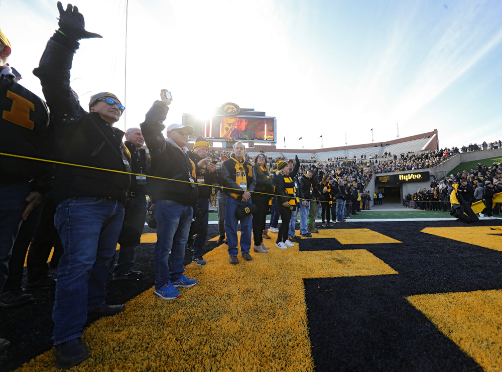 University of Iowa letterwinners form a tunnel for the senior football players before their game at Kinnick Stadium in Iowa City on Saturday, Nov 23, 2019. (Stephen Mally/hawkeyesports.com)