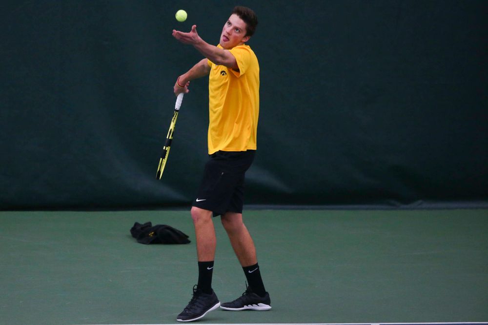 Iowa's Piotr Smietana at a tennis match vs Drake Friday, March 8, 2019 at the Hawkeye Tennis and Recreation Complex. (Lily Smith/hawkeyesports.com)