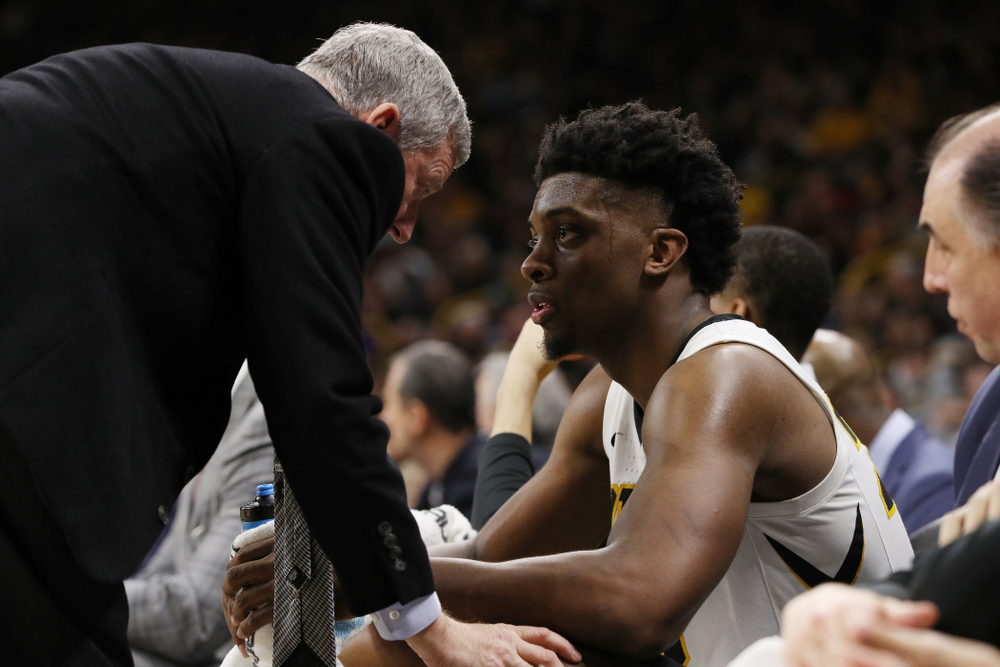 Iowa Hawkeyes forward Tyler Cook (25) and assistant coach Kirk Speraw against the Northwestern Wildcats Sunday, February 10, 2019 at Carver-Hawkeye Arena. (Brian Ray/hawkeyesports.com)
