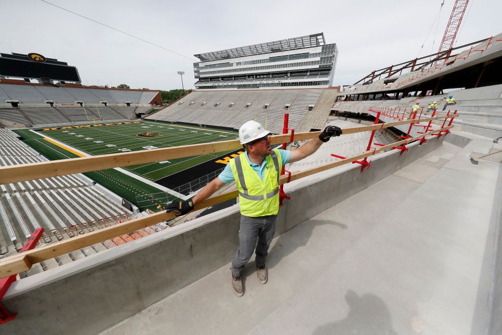 University of Iowa Senior Construction Project Manager Michael Kearns talks about the outdoor seating on the club level of the north end zone Wednesday, June 6, 2018 at Kinnick Stadium. (Brian Ray/hawkeyesports.com)