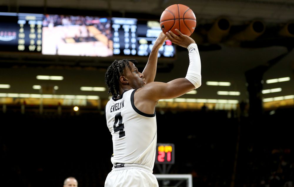 Iowa Hawkeyes guard Bakari Evelyn (4) makes a three point basket against the Maryland Terrapins Friday, January 10, 2020 at Carver-Hawkeye Arena. (Brian Ray/hawkeyesports.com)