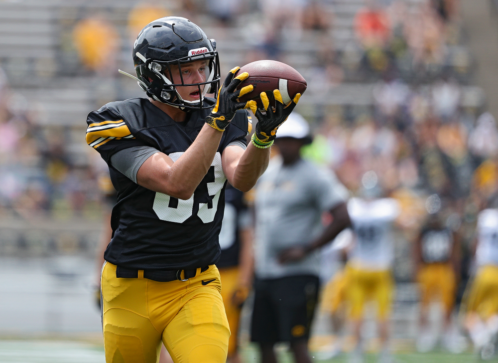 Iowa Hawkeyes wide receiver Alec Kritta (83) pulls in a pass during Fall Camp Practice No. 8 at Kids Day at Kinnick Stadium in Iowa City on Saturday, Aug 10, 2019. (Stephen Mally/hawkeyesports.com)