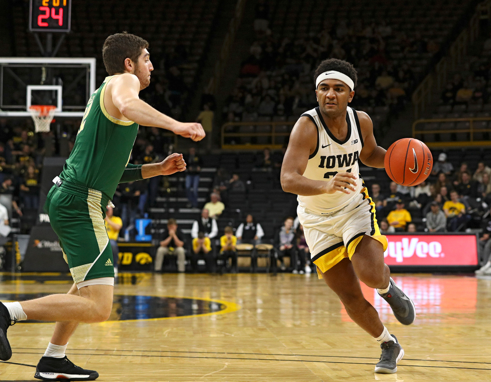 Iowa Hawkeyes guard Nicolas Hobbs (24) drives with the ball during the second half of their game at Carver-Hawkeye Arena in Iowa City on Sunday, Nov 24, 2019. (Stephen Mally/hawkeyesports.com)