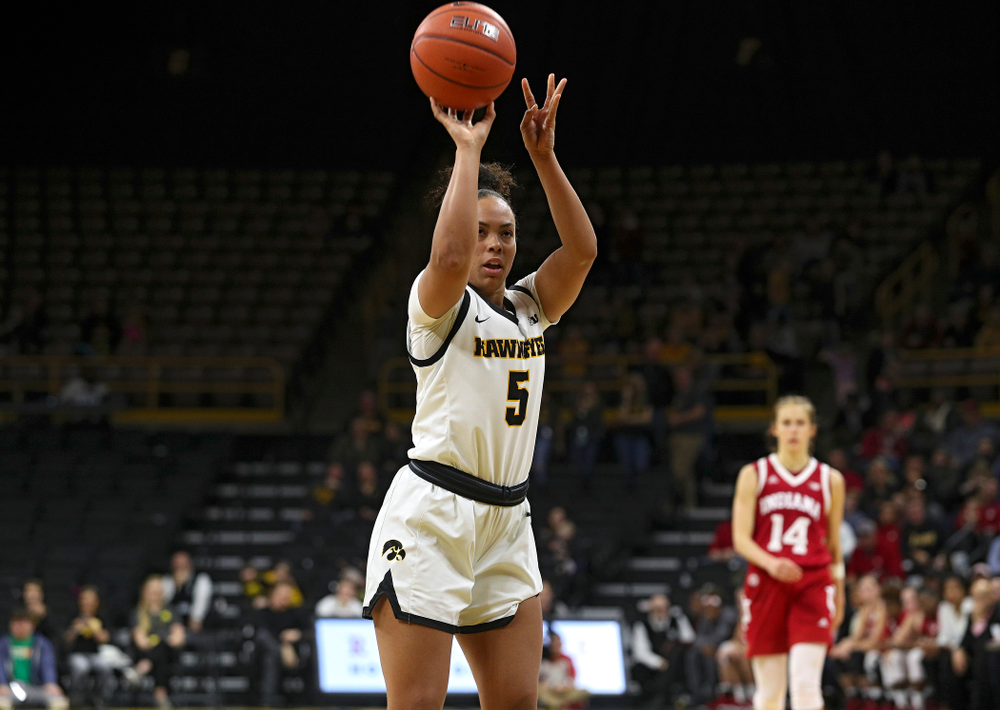 Iowa Hawkeyes guard Alexis Sevillian (5) makes a free throw during the second overtime period of their game at Carver-Hawkeye Arena in Iowa City on Sunday, January 12, 2020. (Stephen Mally/hawkeyesports.com)
