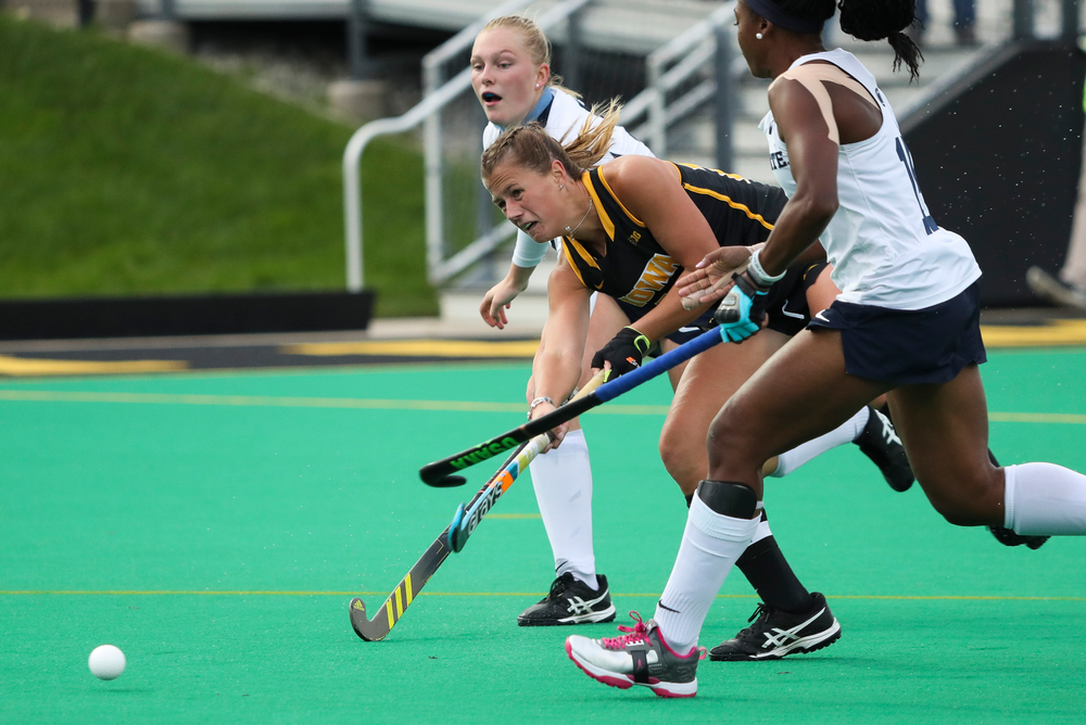 Iowa Hawkeyes midfielder Sophie Sunderland (20) takes a shot during a game against No. 6 Penn State at Grant Field on October 12, 2018. (Tork Mason/hawkeyesports.com)