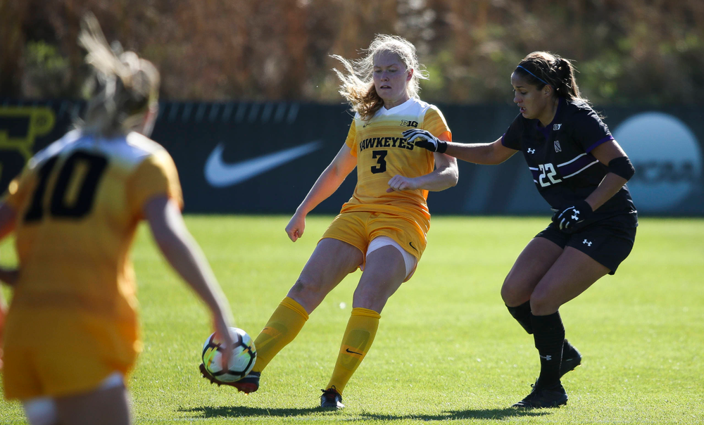 Iowa Hawkeyes defender Morgan Kemerling (3) passes the ball during a game against Northwestern at the Iowa Soccer Complex on October 21, 2018. (Tork Mason/hawkeyesports.com)
