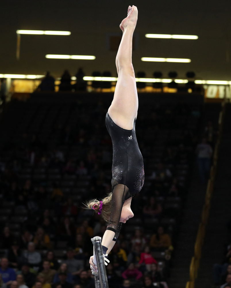Iowa’s Allyson Steffensmeier competes on the bars against Michigan Friday, February 14, 2020 at Carver-Hawkeye Arena. (Brian Ray/hawkeyesports.com)